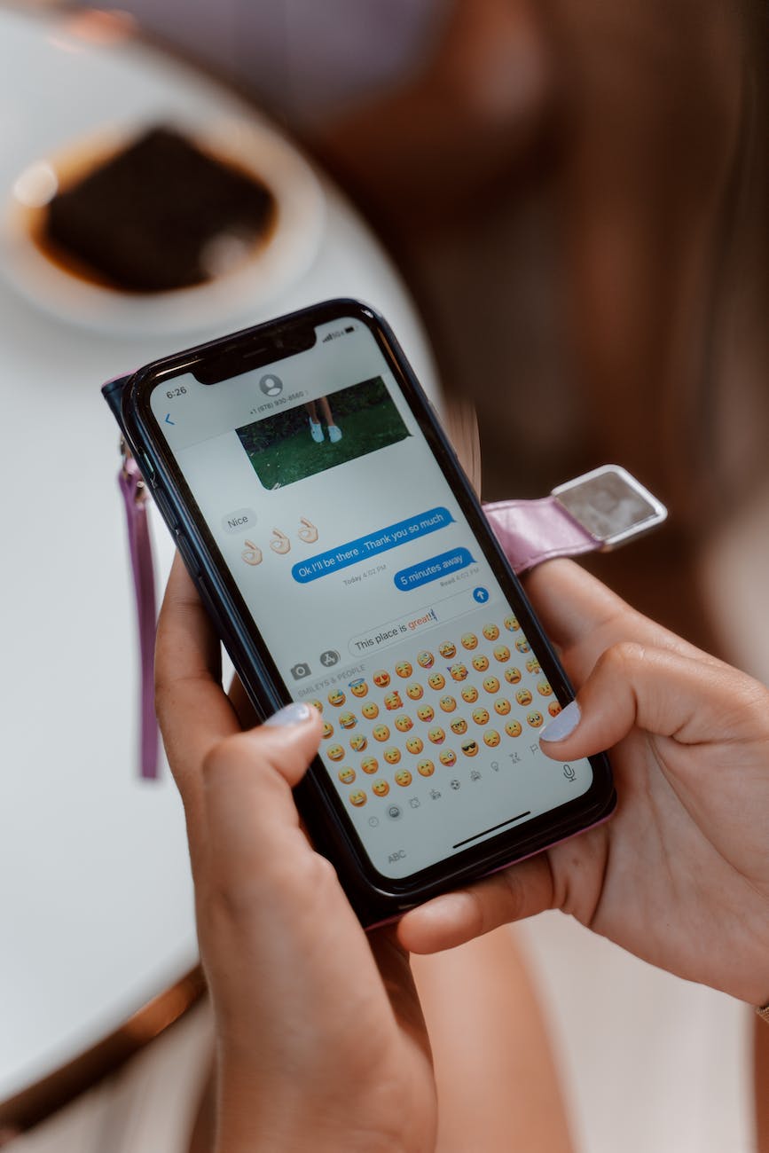 close up shot of a person sending text message